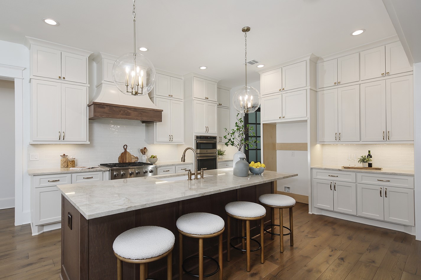 630 Lonestar Road Huntsville, TX 77340 - Photo 17 of 48 a kitchen with stainless steel appliances granite countertop a sink a stove a dining table and chairs