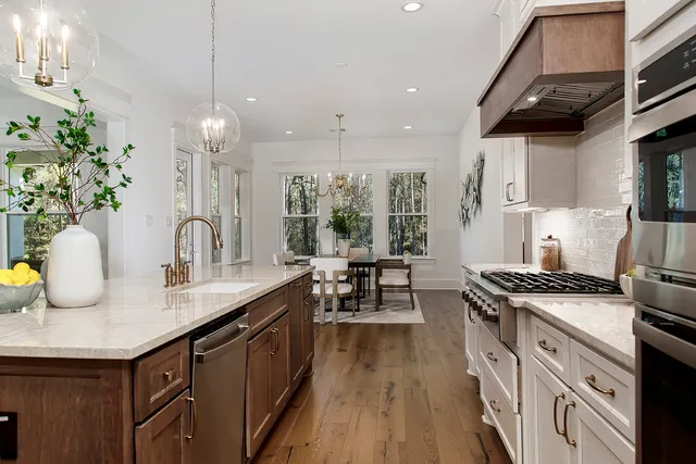 a spacious bedroom with a large bed and windows