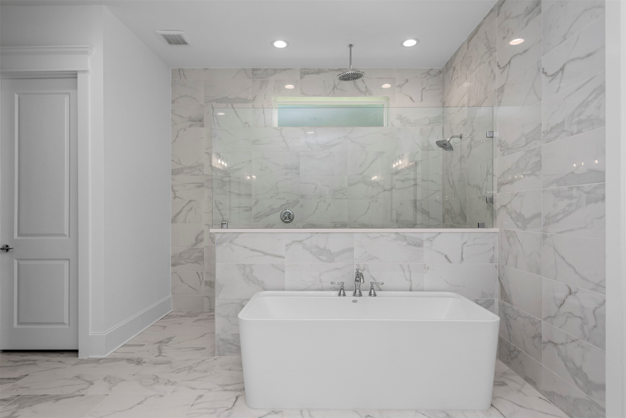 630 Lonestar Road Huntsville, TX 77340 - Photo 30 of 48 a bathroom with a bathtub and a shower