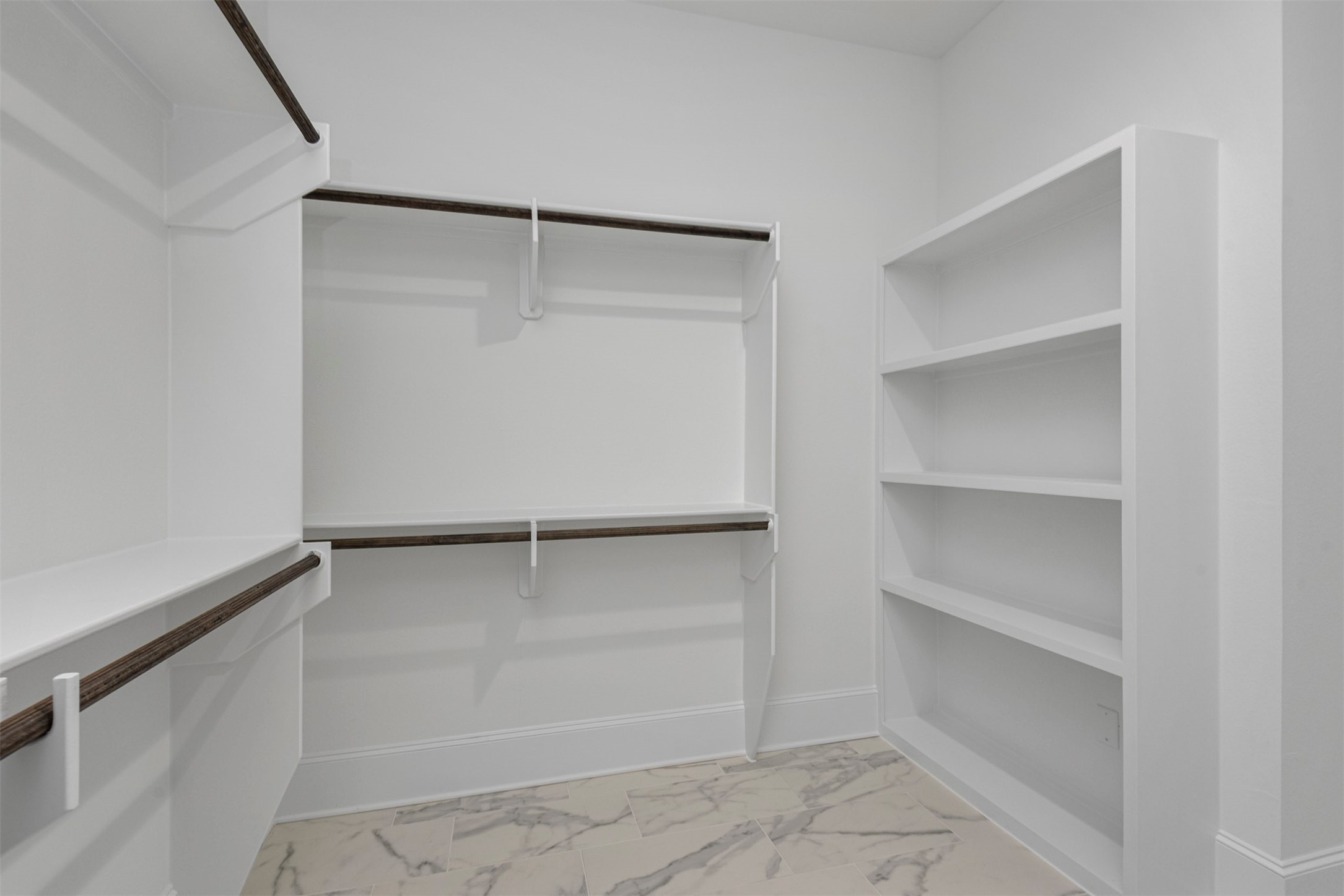 630 Lonestar Road Huntsville, TX 77340 - Photo 33 of 48 a view of an empty walk in closet