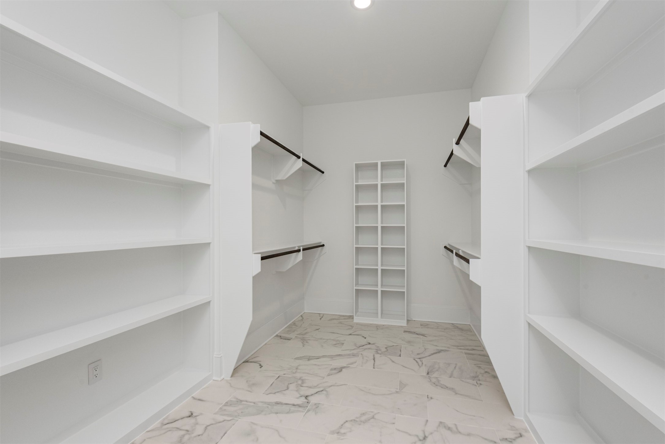 630 Lonestar Road Huntsville, TX 77340 - Photo 34 of 48 Custom built-ins in primary closets.