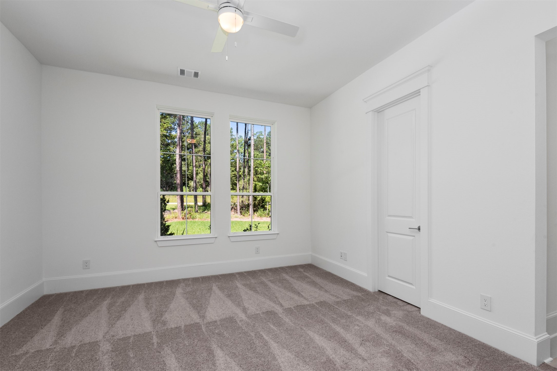 630 Lonestar Road Huntsville, TX 77340 - Photo 36 of 48 Bedroom 2 has walk-in closet and direct access to separate private vanity area with shared tub/shower/toilet.