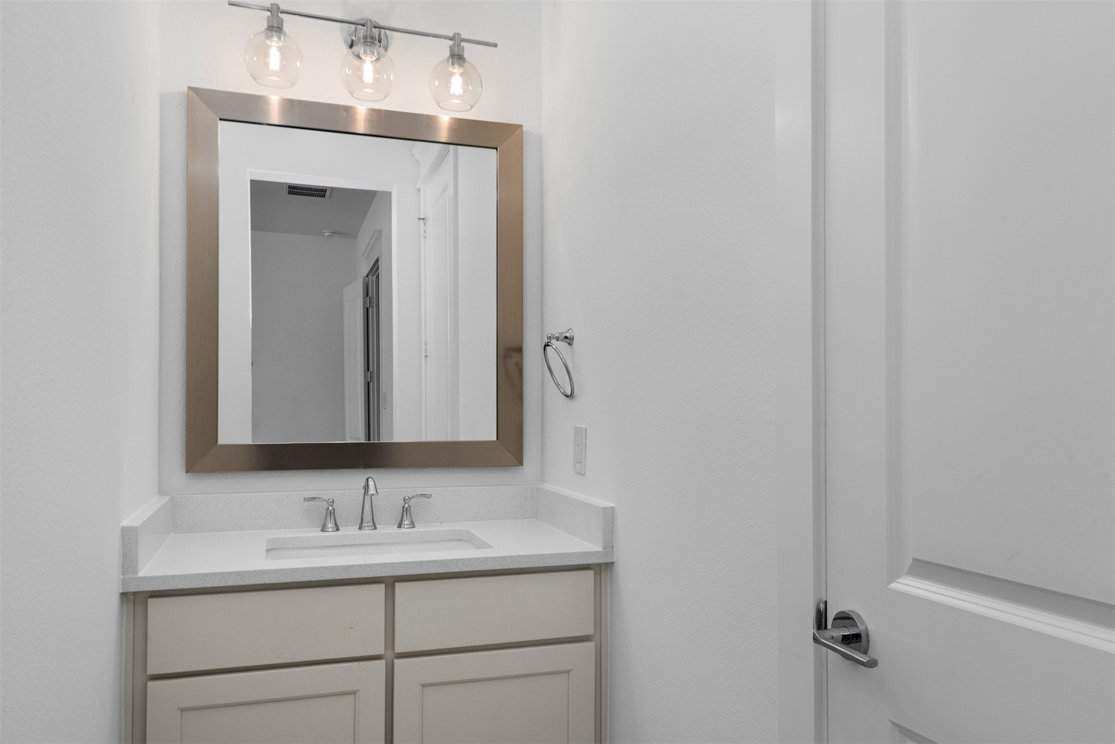 630 Lonestar Road Huntsville, TX 77340 - Photo 37 of 48 a bathroom with a sink and a mirror