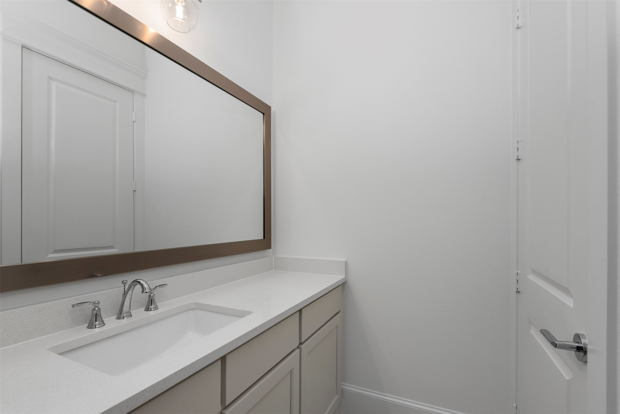 630 Lonestar Road Huntsville, TX 77340 - Photo 39 of 48 a bathroom with a sink and a mirror