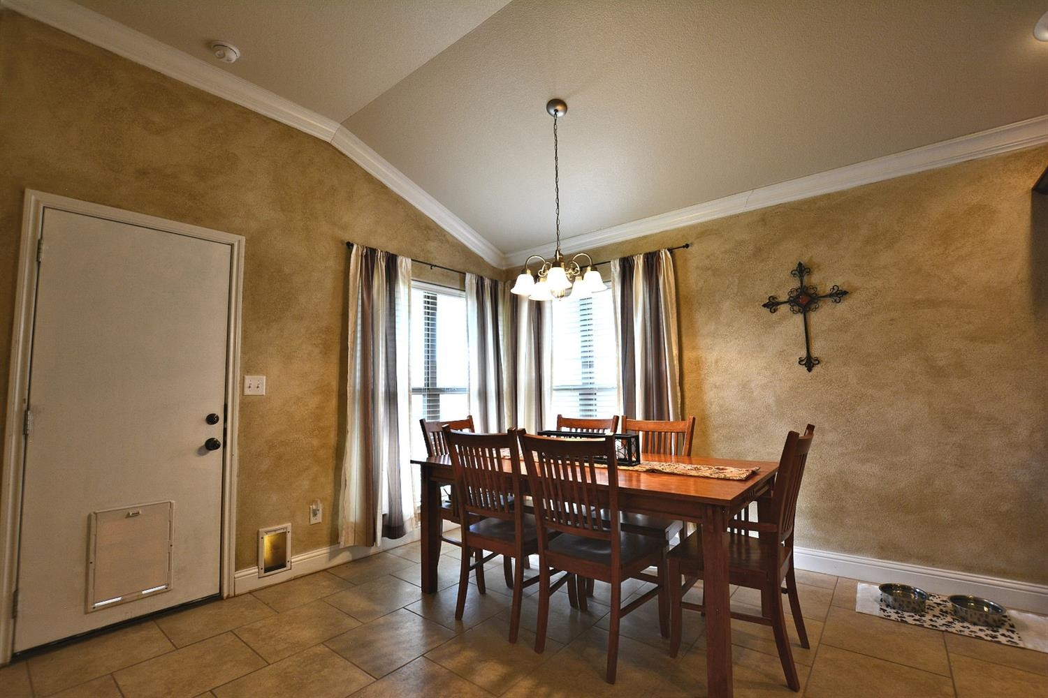 3703 Rochester Avenue Lubbock, TX 79407 - Photo 5 of 20 a view of a dining room with furniture and window