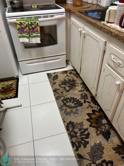 183 Camden H, Unit 183 West Palm Beach, FL 33417 - Photo 6 of 9 a close view of utility room