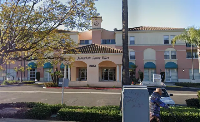 a front view of a building with street view