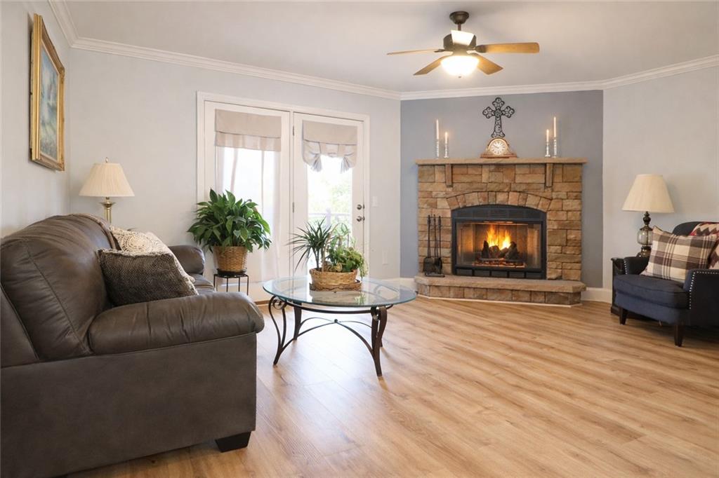 4650 Perry Road Gainesville, GA 30506 - Photo 11 of 41 a living room with furniture and a fireplace
