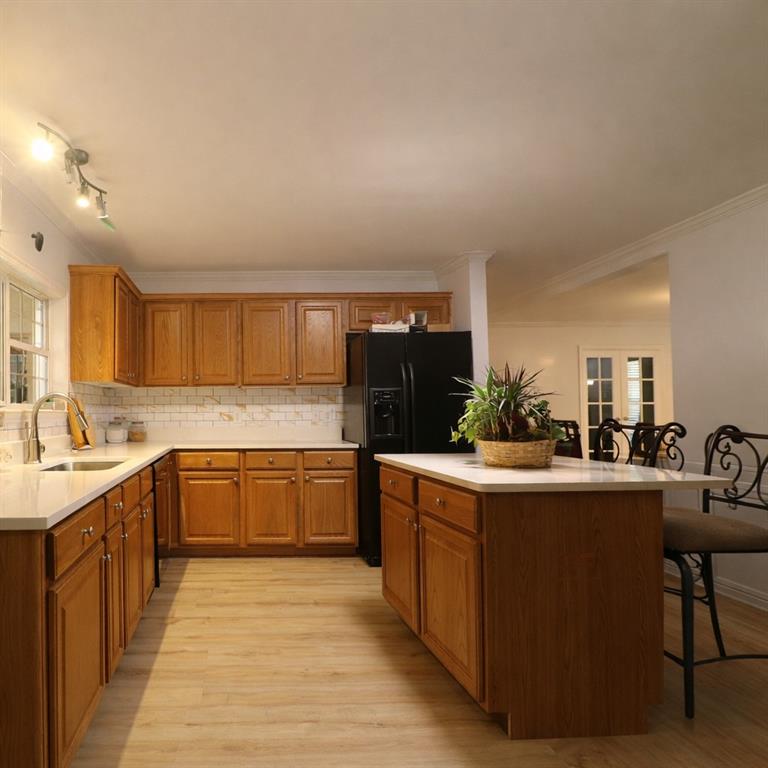 4650 Perry Road Gainesville, GA 30506 - Photo 17 of 41 a kitchen with a sink stove and cabinets
