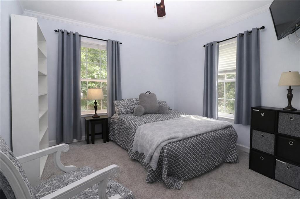 4650 Perry Road Gainesville, GA 30506 - Photo 25 of 41 a bedroom with a bed and a window