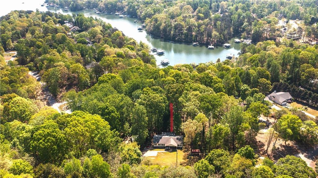 4650 Perry Road Gainesville, GA 30506 - Photo 28 of 41 a backyard of a house with a yard and fountain