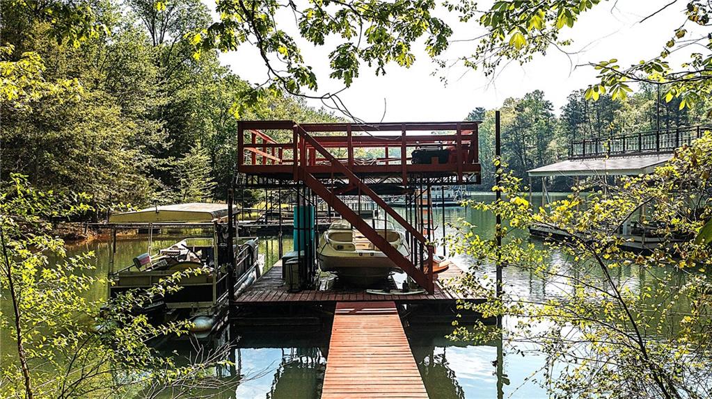 4650 Perry Road Gainesville, GA 30506 - Photo 29 of 41 a view of a house with large trees