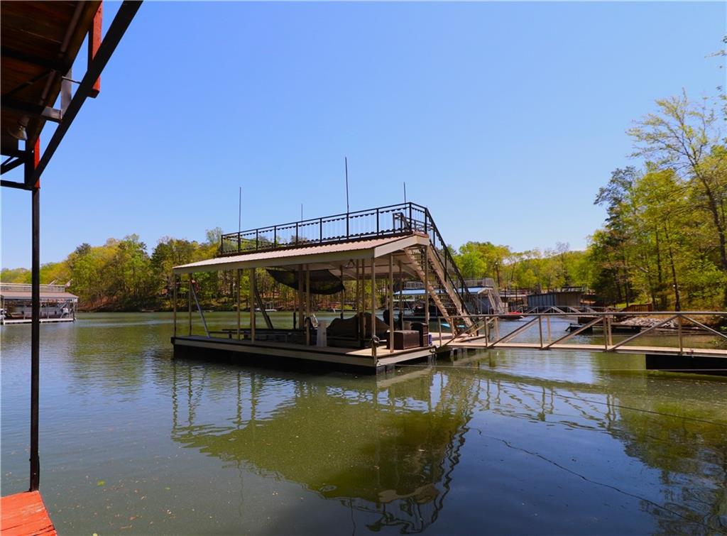 4650 Perry Road Gainesville, GA 30506 - Photo 31 of 41 a view of a lake with boats and trees