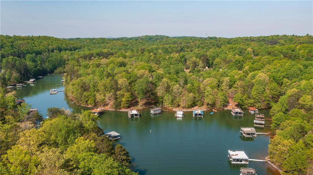4650 Perry Road Gainesville, GA 30506 - Photo 39 of 41 a view of lake with residential houses with outdoor space and lake view