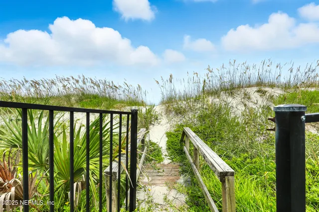 a view of swimming pool from a balcony