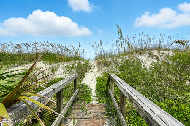 a view of swimming pool from a balcony