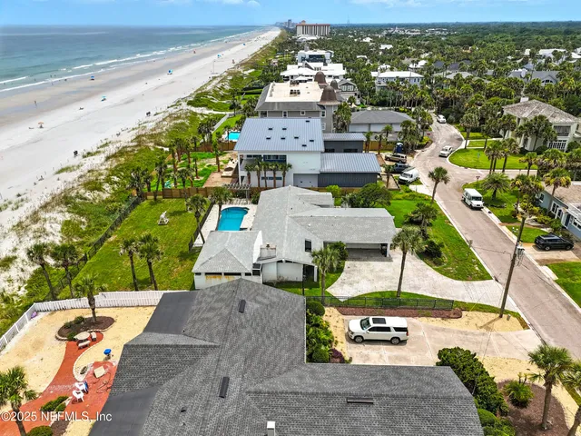 an aerial view of a house with a garden