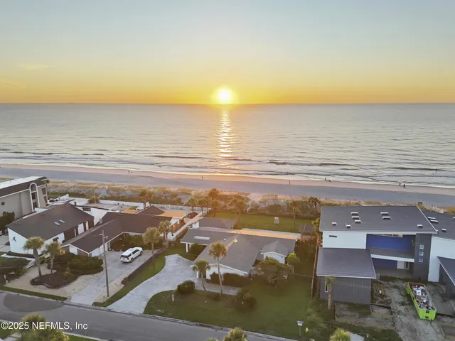 a view of a balcony with an ocean