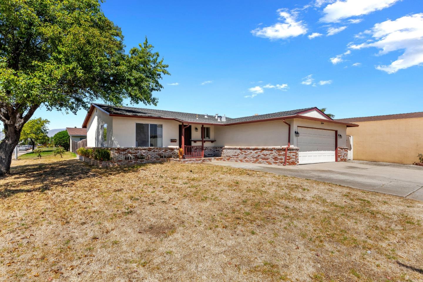 1607 Chico Way Salinas, CA 93906 - Photo 22 of 32 a front view of house with yard and trees