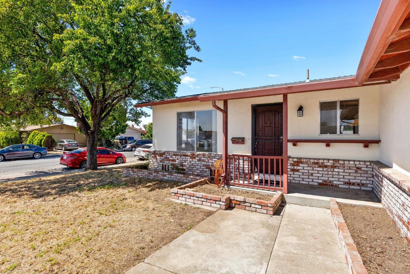 1607 Chico Way Salinas, CA 93906 - Photo 24 of 32 a view of a patio with a table and chairs and wooden fence
