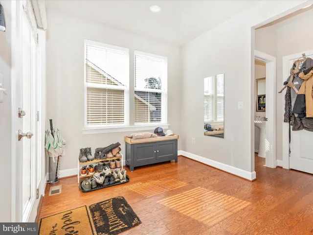 a spacious bedroom with a bed and a couch
