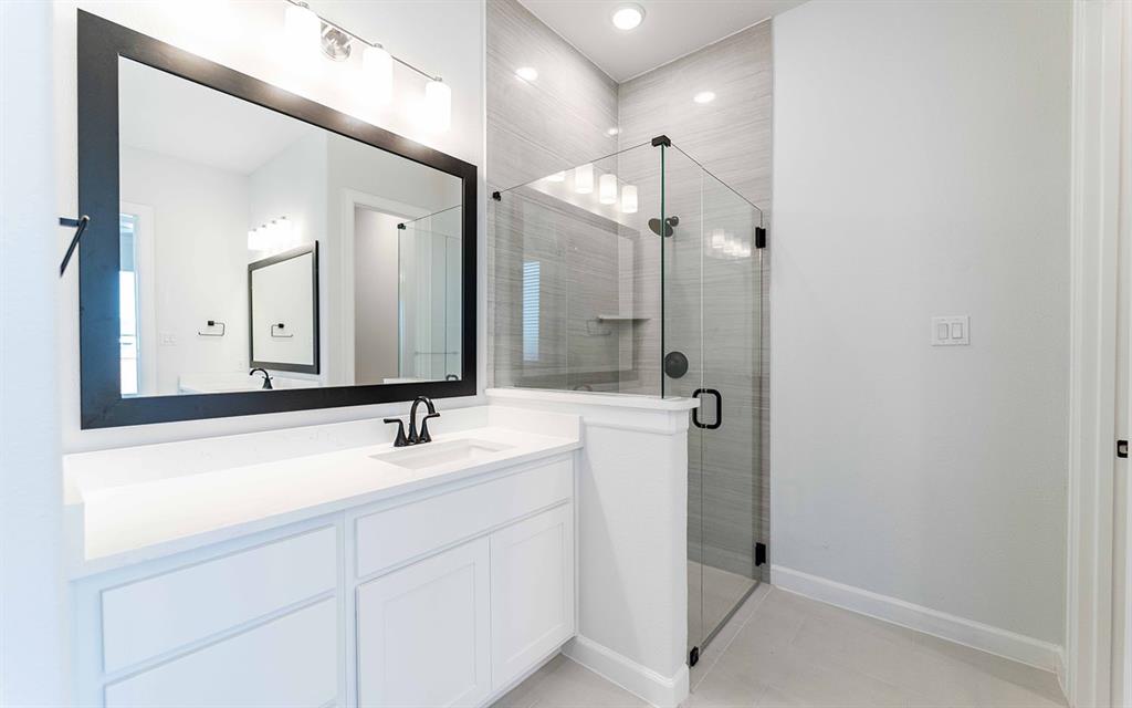 1924 Casting Ridge Mesquite, TX 75181 - Photo 16 of 30 a bathroom with a sink and mirror