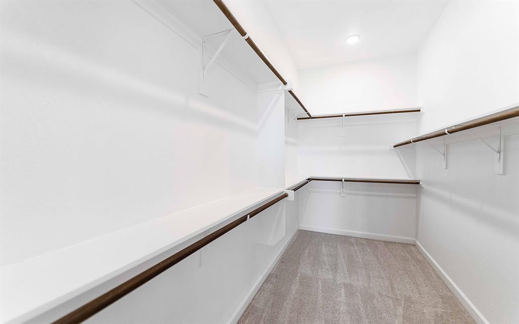 1924 Casting Ridge Mesquite, TX 75181 - Photo 19 of 30 a view of a room with racks on the wall