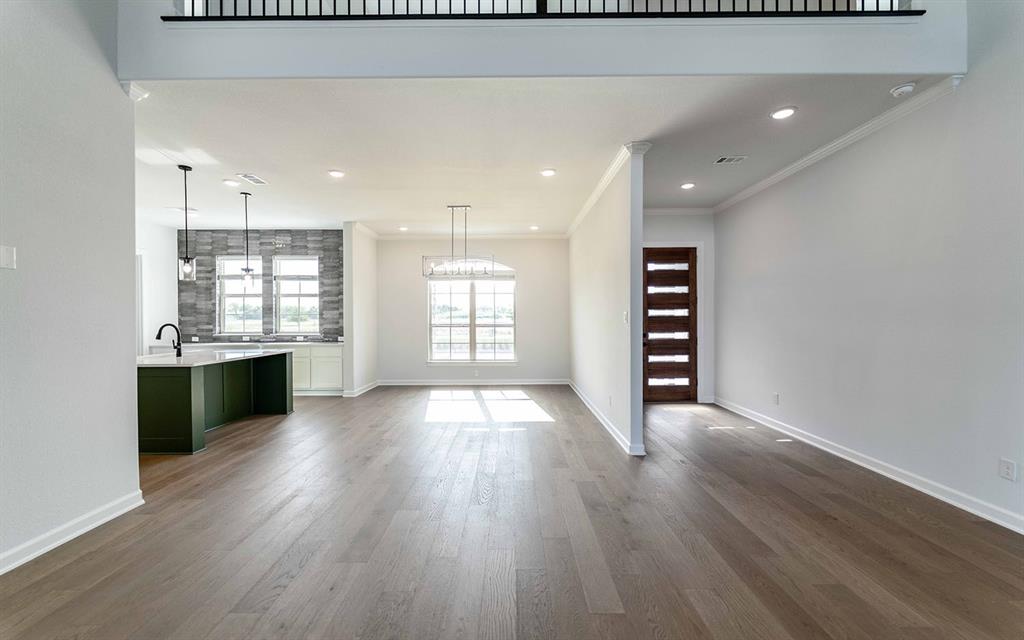 1924 Casting Ridge Mesquite, TX 75181 - Photo 2 of 30 wooden floor in an empty room with a window