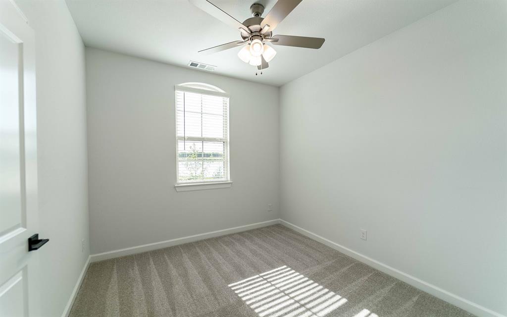 1924 Casting Ridge Mesquite, TX 75181 - Photo 25 of 30 wooden floor in an empty room with a window