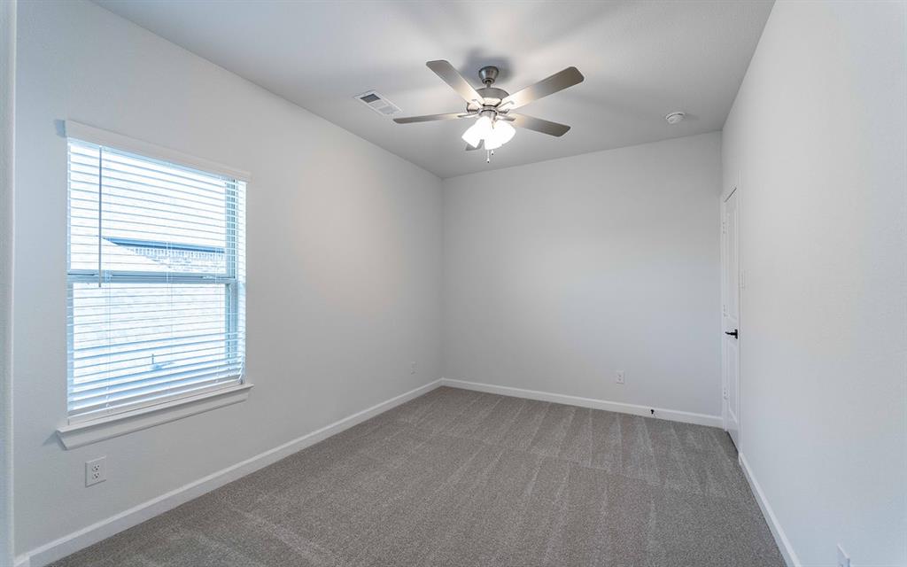 1924 Casting Ridge Mesquite, TX 75181 - Photo 26 of 30 a view of an empty room with a window