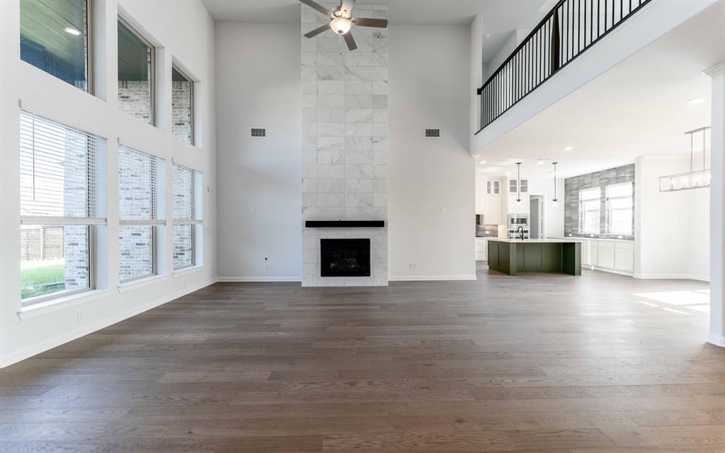 1924 Casting Ridge Mesquite, TX 75181 - Photo 4 of 30 a view of an empty room with a fireplace and a window
