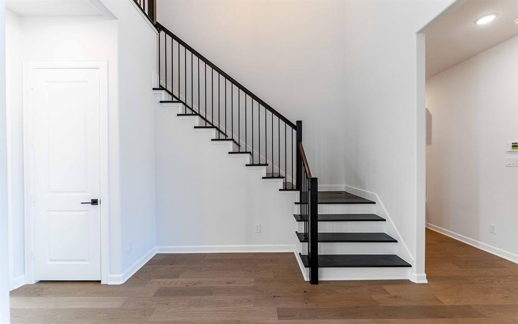 1924 Casting Ridge Mesquite, TX 75181 - Photo 6 of 30 a view of entryway and hall with wooden floor