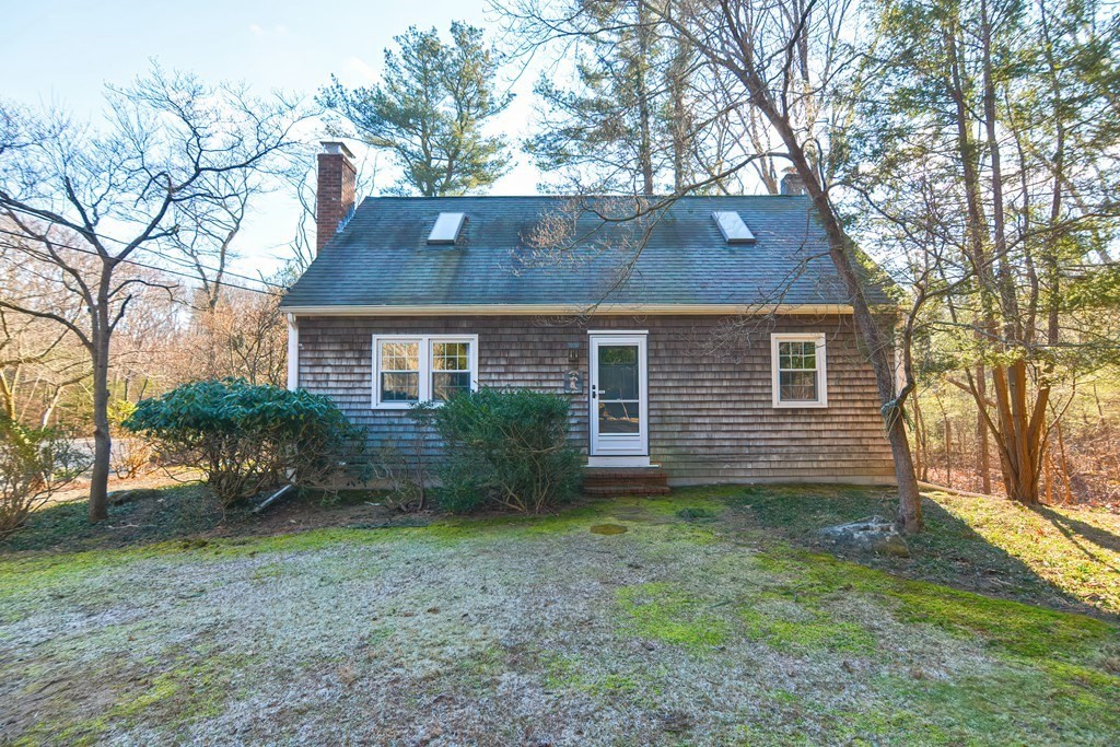 325 Spring Street Wrentham, MA 02093 - Photo 17 of 42 a front view of a house with a garden