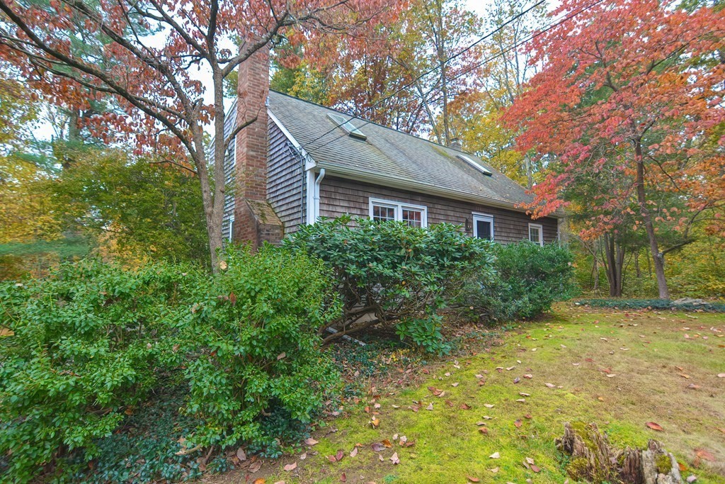 325 Spring Street Wrentham, MA 02093 - Photo 2 of 42 a view of a house with a yard