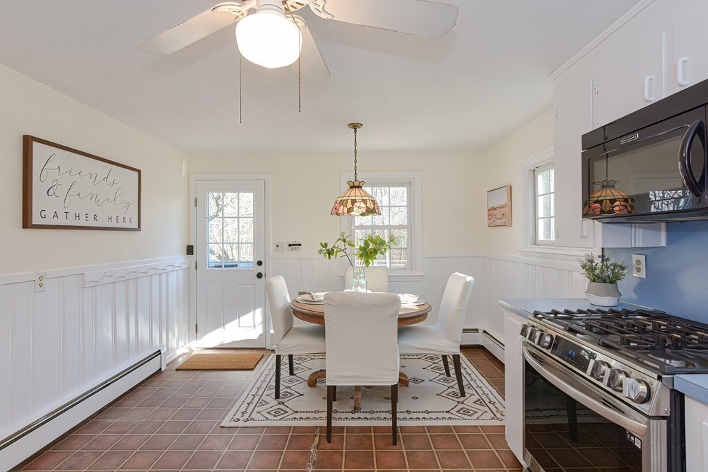 325 Spring Street Wrentham, MA 02093 - Photo 22 of 42 a view of a dining room with furniture window and wooden floor