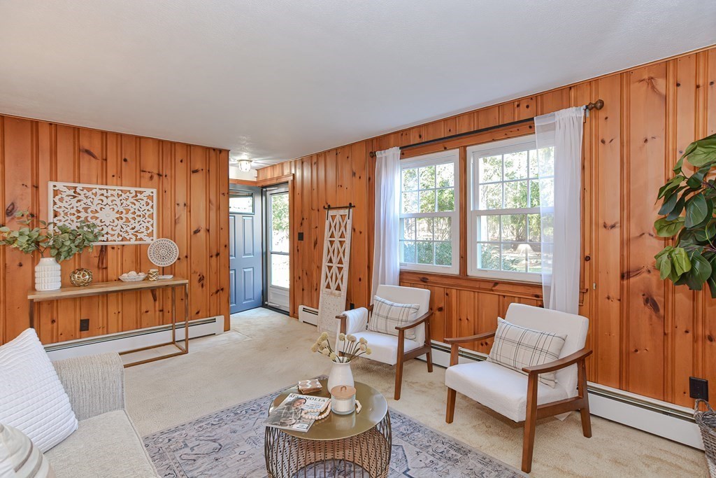325 Spring Street Wrentham, MA 02093 - Photo 26 of 42 a living room with furniture and a large window
