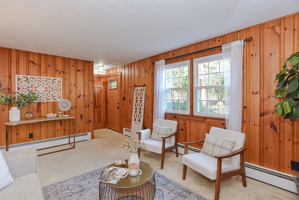 325 Spring Street Wrentham, MA 02093 - Photo 28 of 42 a living room with furniture and a large window