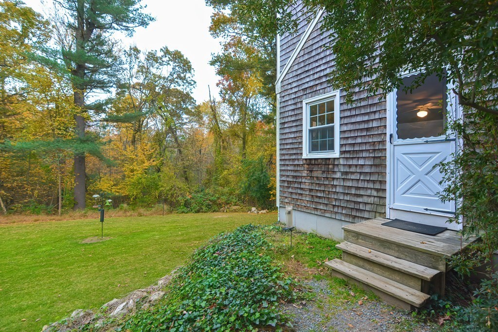 325 Spring Street Wrentham, MA 02093 - Photo 3 of 42 a view of a house with a yard