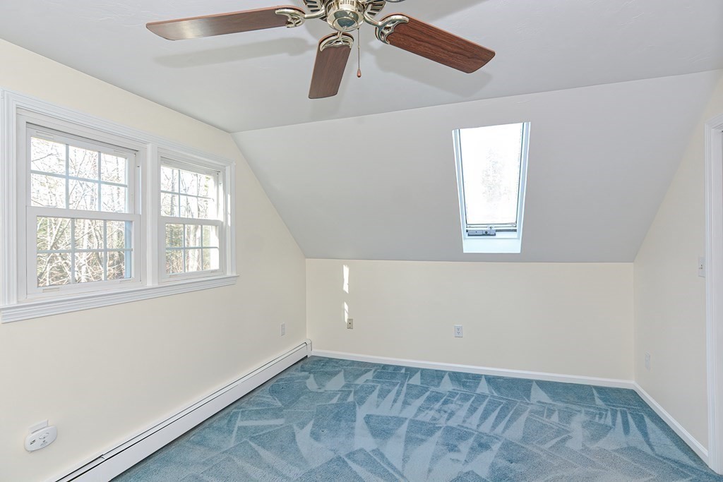 325 Spring Street Wrentham, MA 02093 - Photo 32 of 42 a view of an empty room with a window