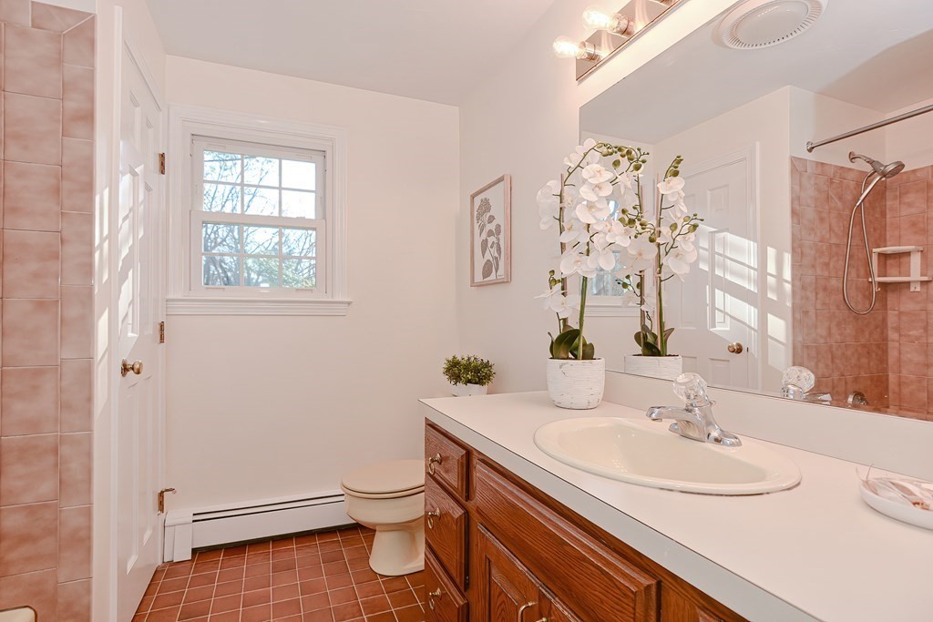 325 Spring Street Wrentham, MA 02093 - Photo 38 of 42 a bathroom with a sink toilet and shower