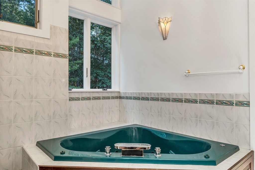 3 Burning Bush Drive Boxford, MA 01921 - Photo 37 of 42 a bathroom with a bathtub