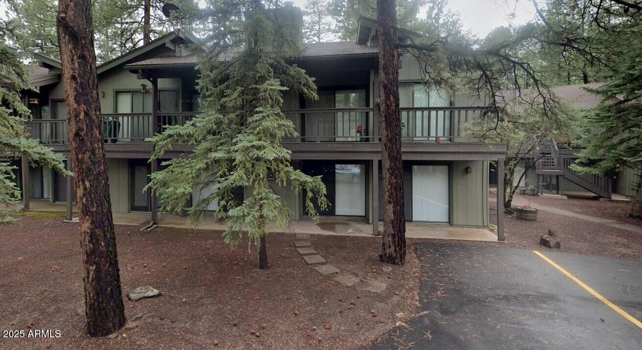 4479 Resort Loop, Unit A21 Pinetop, AZ 85935 - Photo 1 of 12 a view of a house with a tree