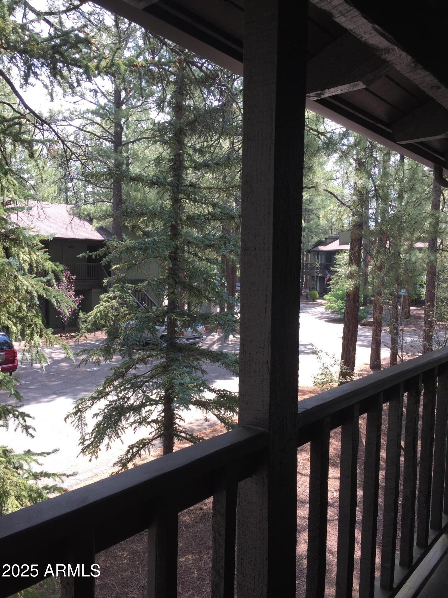 4479 Resort Loop, Unit A21 Pinetop, AZ 85935 - Photo 2 of 12 a view of a porch with a yard