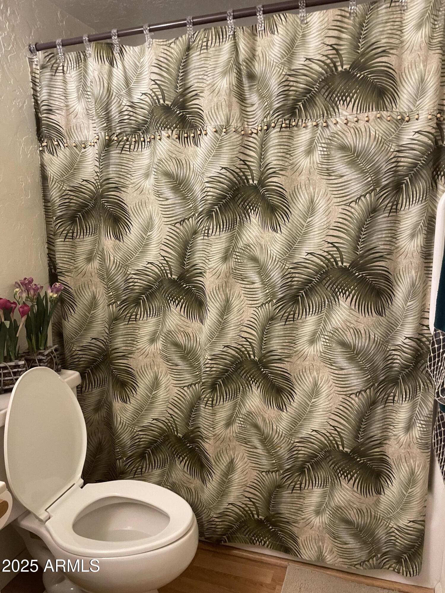 4479 Resort Loop, Unit A21 Pinetop, AZ 85935 - Photo 7 of 12 a bathroom with a toilet and a sink