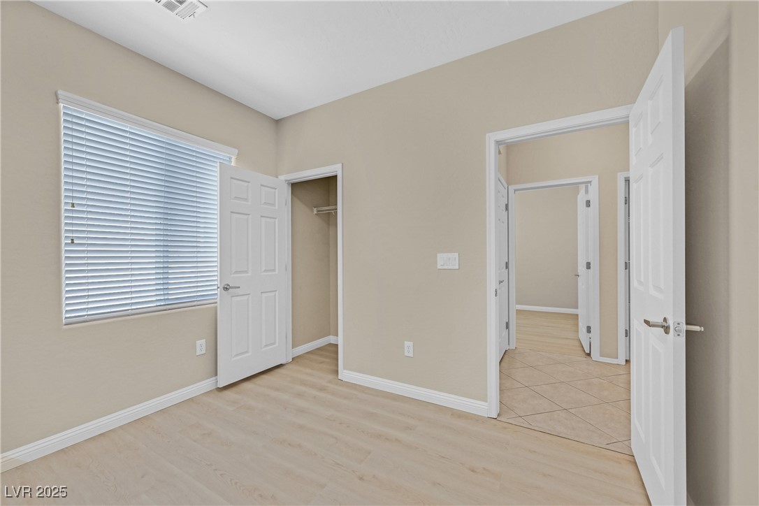 2407 Jada Drive Henderson, NV 89044 - Photo 9 of 42 Bedroom 1has good size closet has New LVT