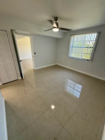 a view of room with a sink and a toilet