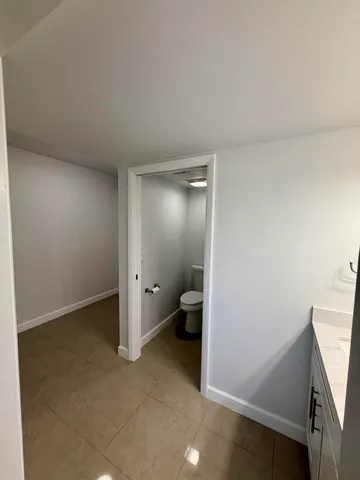a bathroom with a sink and a toilet
