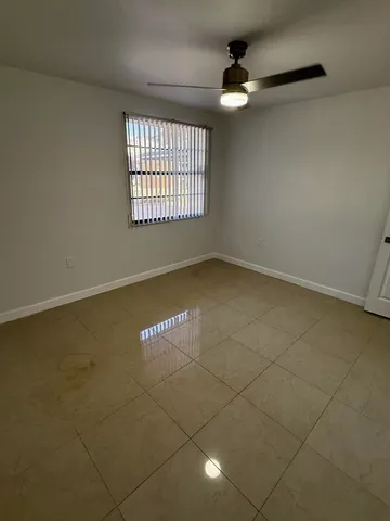 a bathroom with a tub sink and toilet