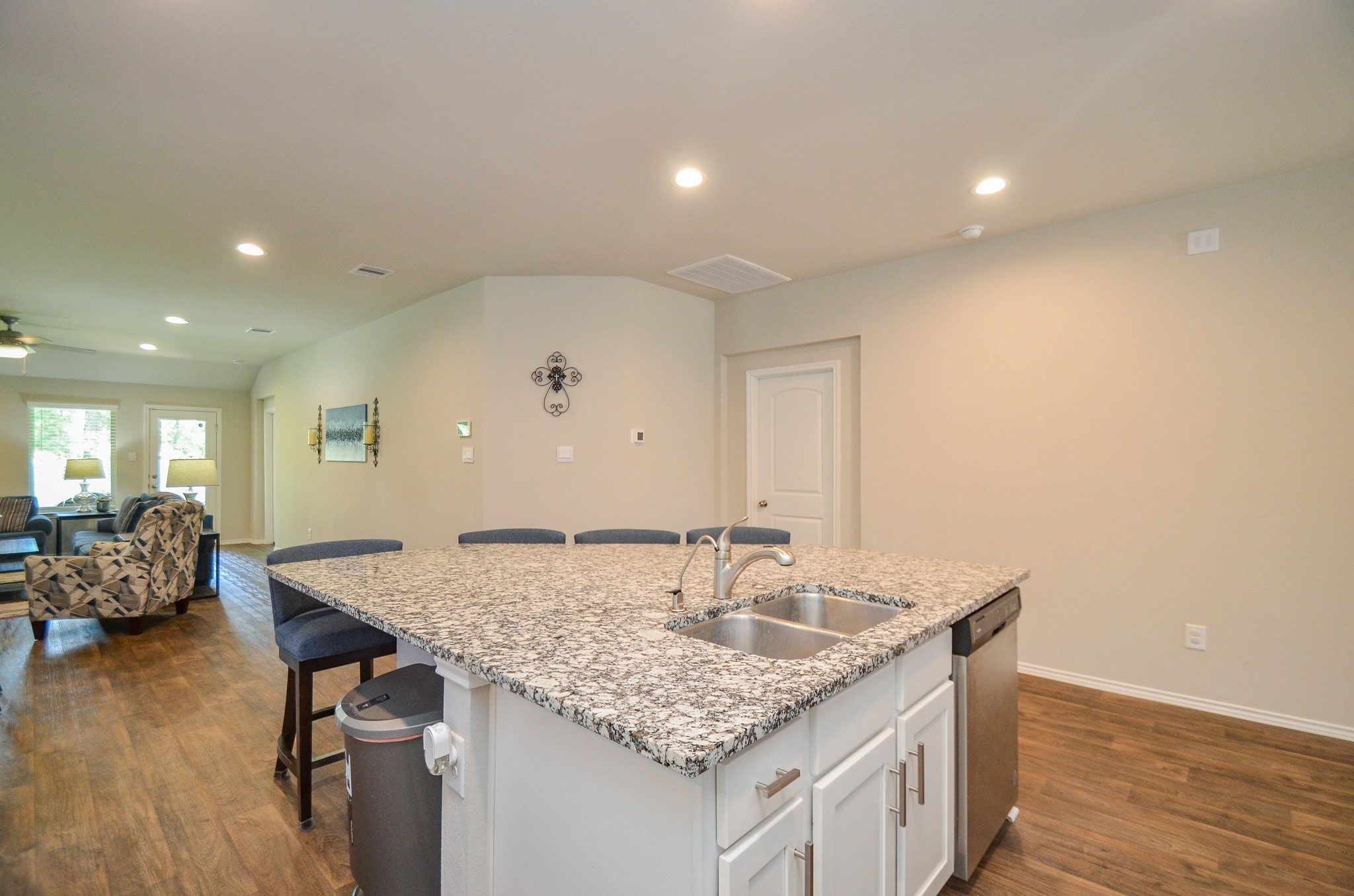 3810 Willow Valley Conroe, TX 77301 - Photo 11 of 38 a kitchen with center island table and chairs