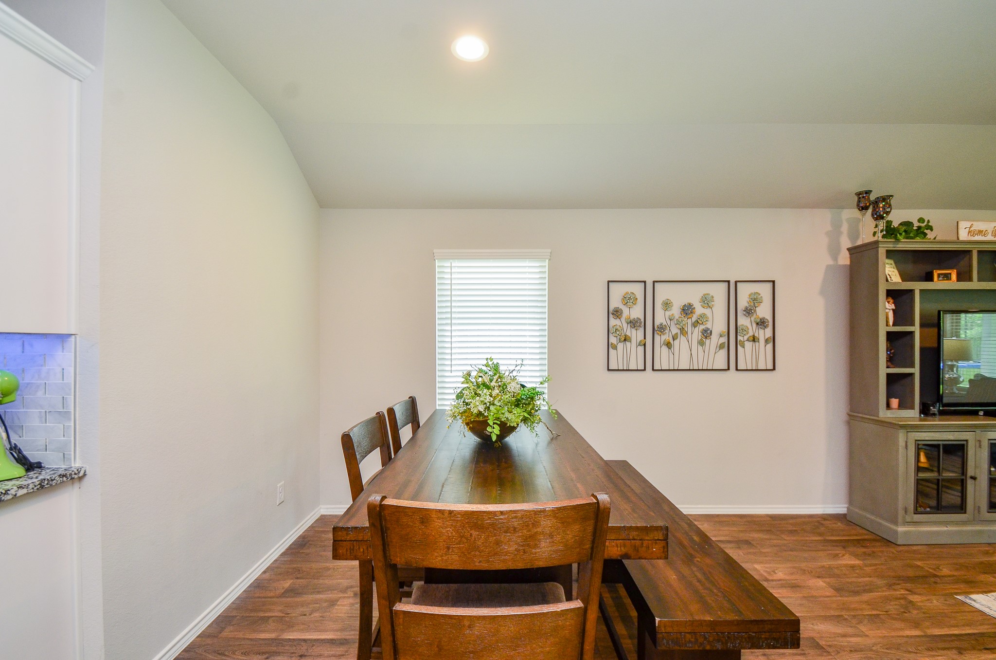 3810 Willow Valley Conroe, TX 77301 - Photo 14 of 38 a view of a dining room with furniture and wooden floor